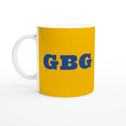 Gul och blå mugg med GBG-tryck, inspirerad av Göteborgs officiella färger. En perfekt souvenir eller kaffekopp.