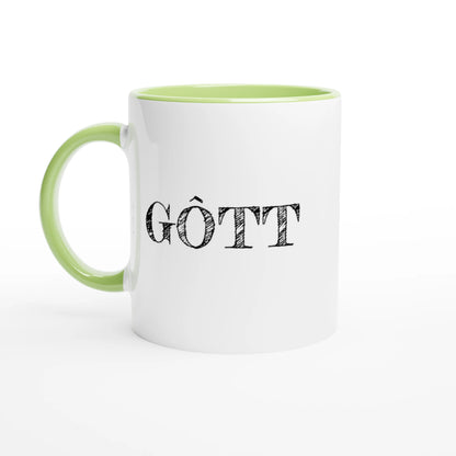 Vit fika-mugg med grön insida och handtag. Texten GÔTT tryckt i svart vintage-stil på utsidan.