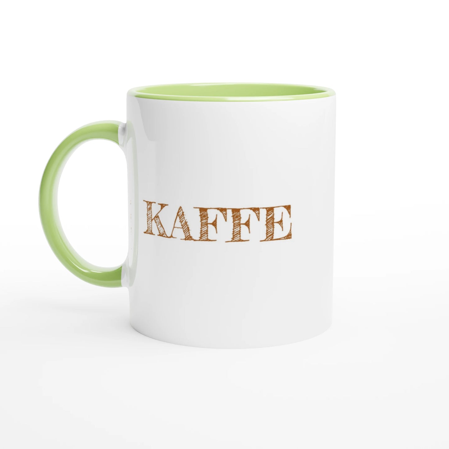 Vit fika-mugg med grön insida och handtag. Texten KAFFE tryckt i brun vintage-stil på utsidan.