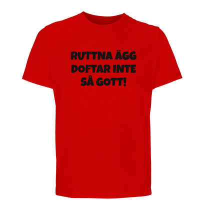 Röd t-shirt med humortryck 'Ruttna ägg doftar inte så gott'. Tillverkad i mjuk bomull för hög komfort.